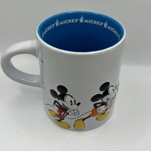 Disney Parks Mickey Mouse Coffee Mug or Tea Cup - Embossed White and Blue